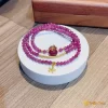 Chuỗi ruby cắt giác mic cham vàng & túi tiền ruby